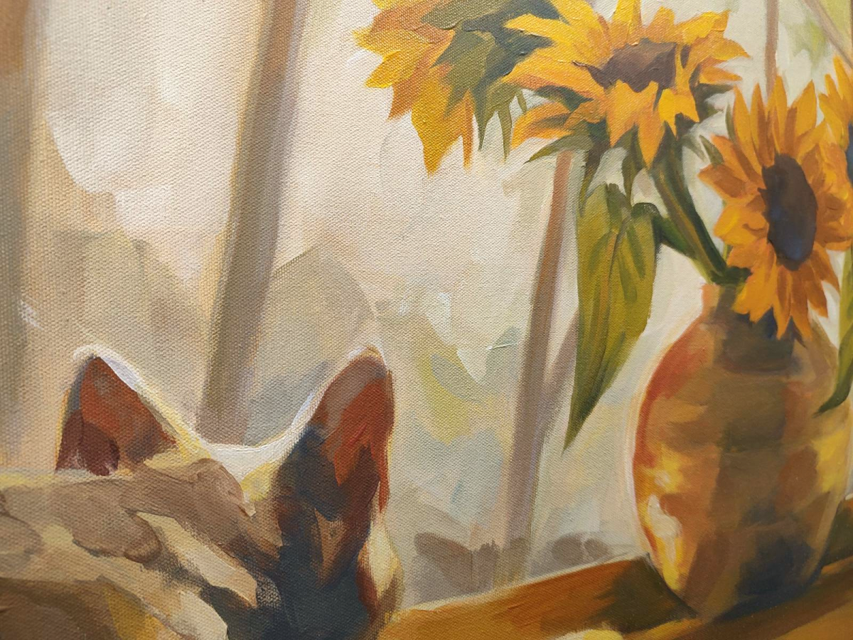 Kot ze słonecznikami